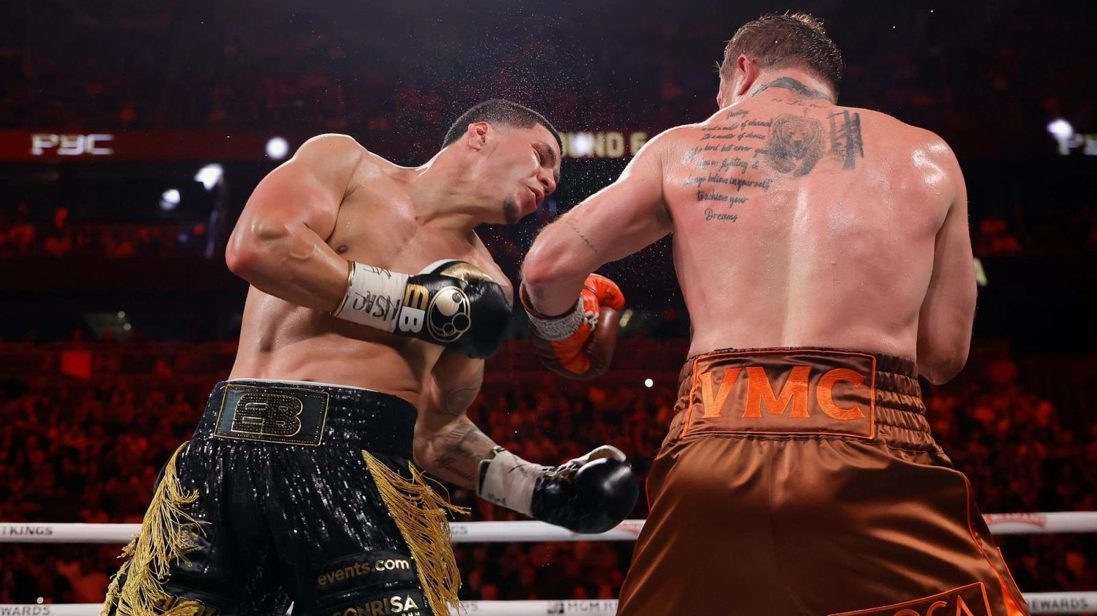Saul Canelo Alvarez intensely staring down his opponent inside the boxing ring